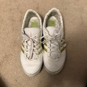 White and gold adidas sneakers